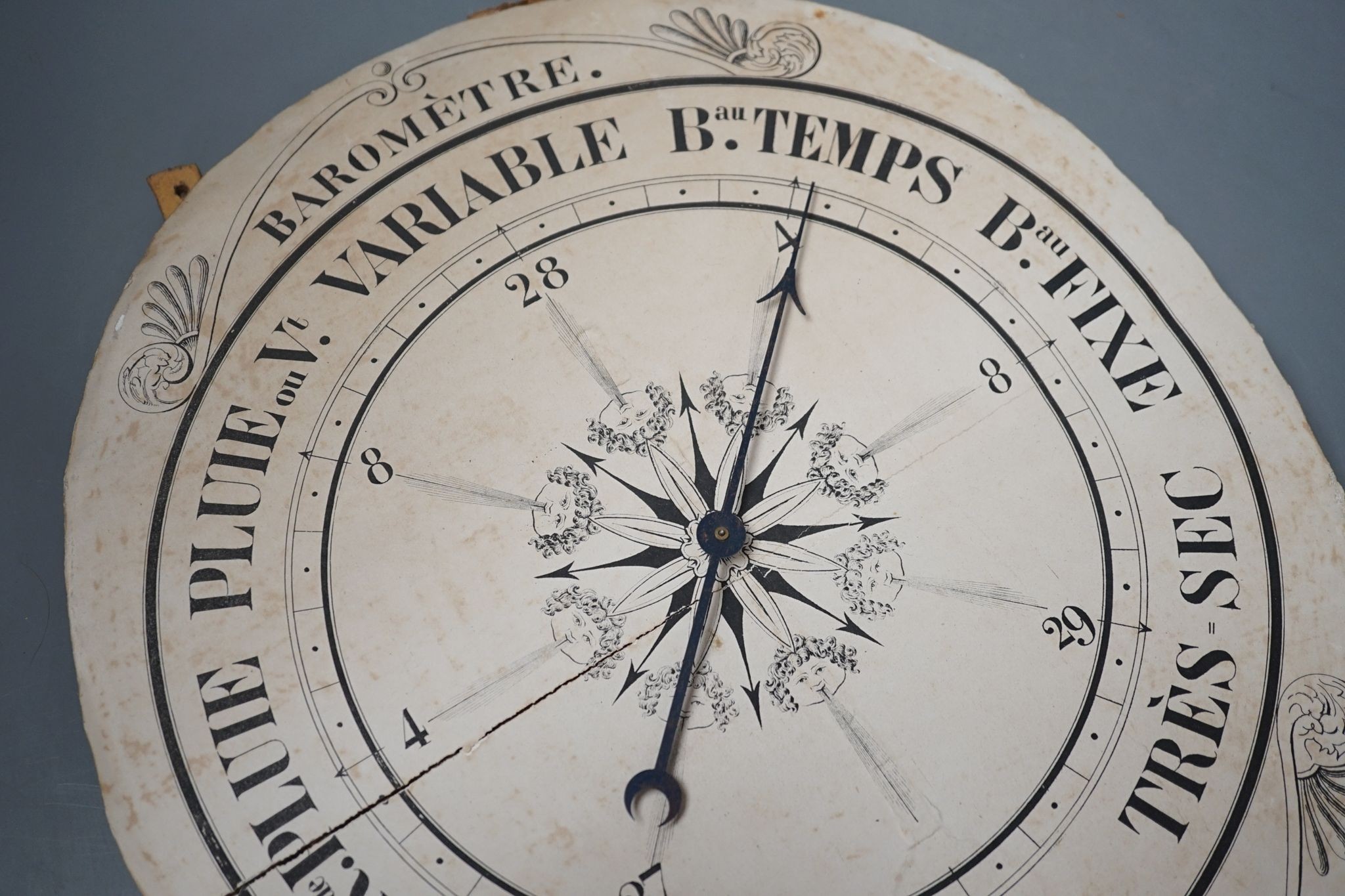 A 19th century printed barometer dial 38cm